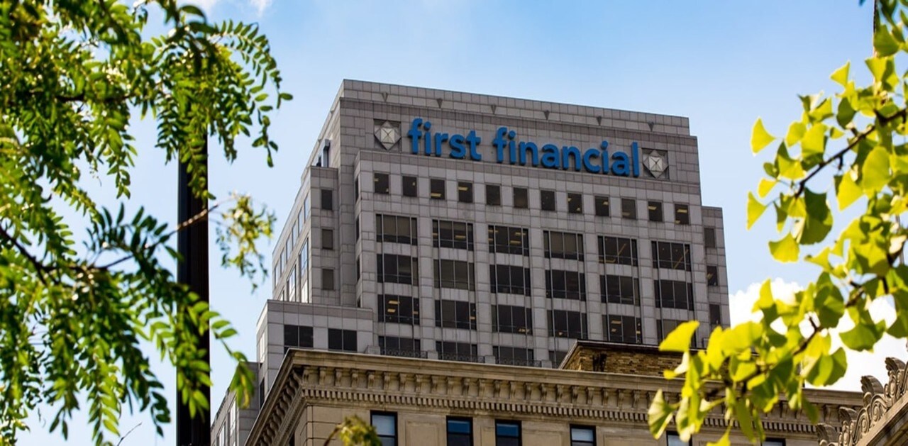 Top of First Financial Center building between trees