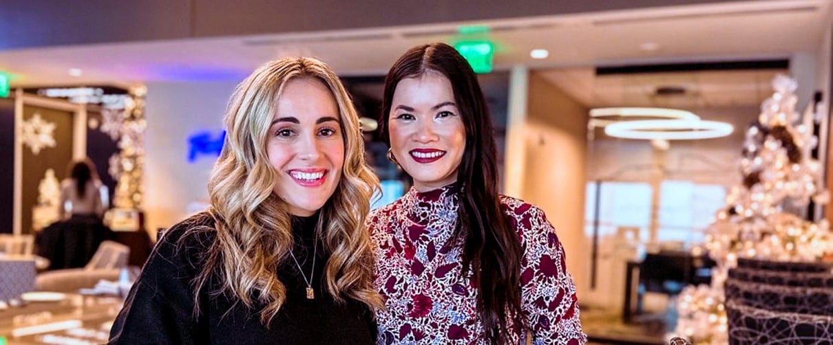 Two First Financial Bank employees posing for photo