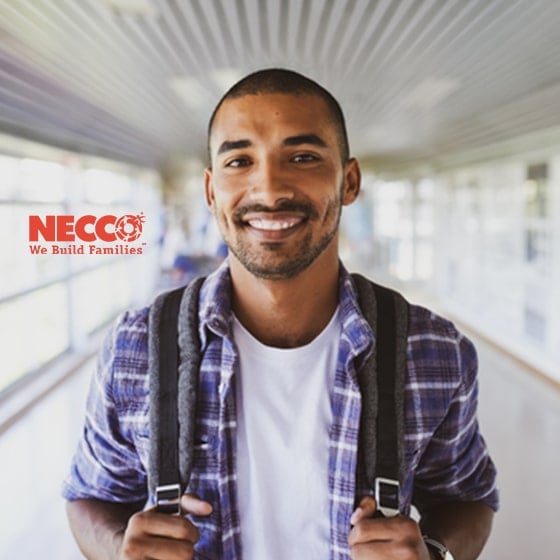 Young Hispanic man holding backpack, with Necco logo