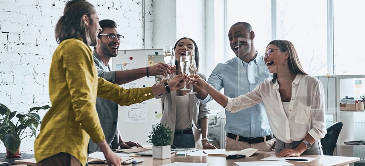 Coworkers making a toast at office party