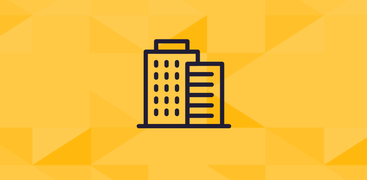 Black illustration of a commercial building on a gold tessellated background