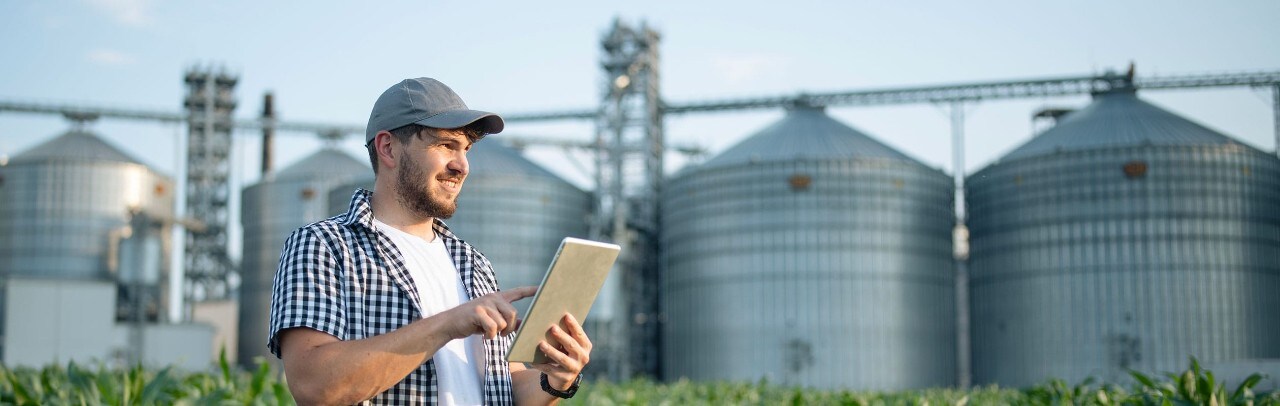 Farmer in combine overlooking crop