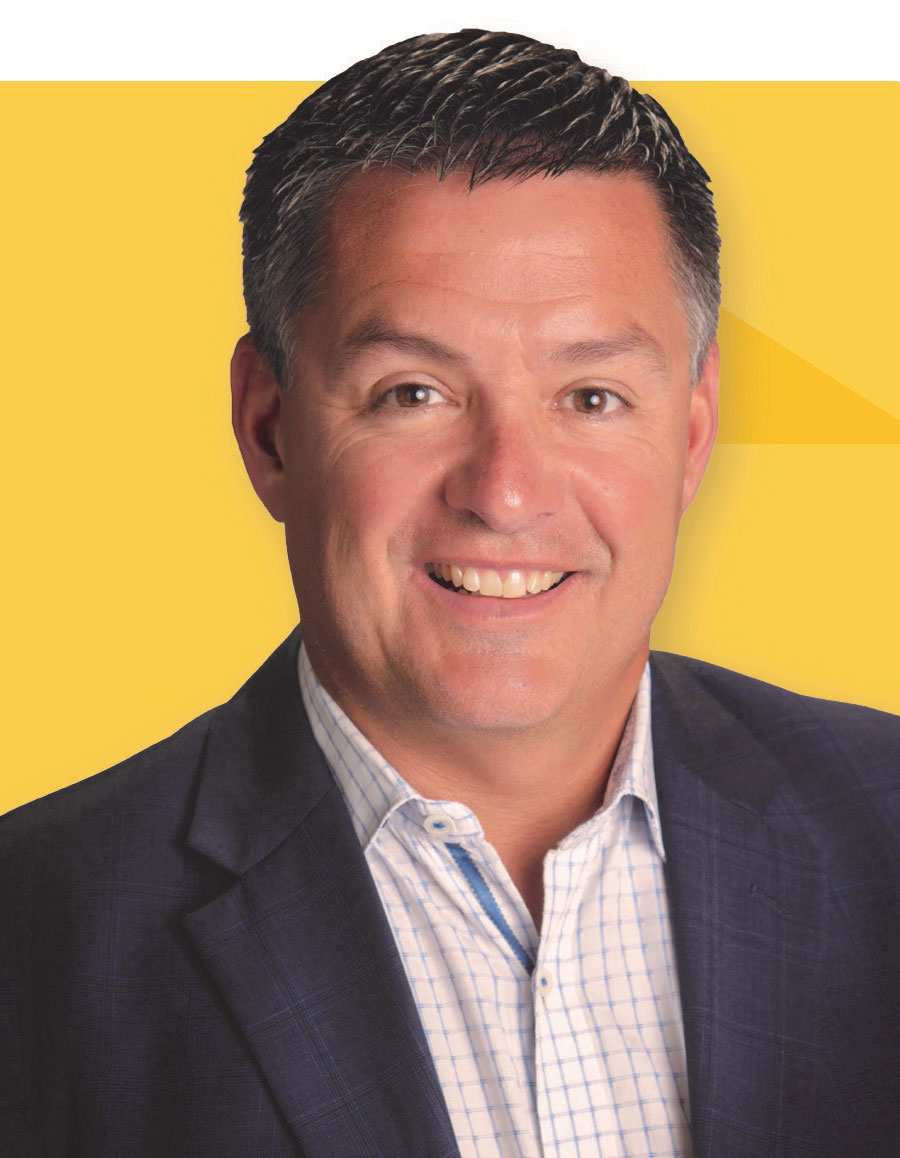 Headshot of Tony Gambaiani on gold tessellated background