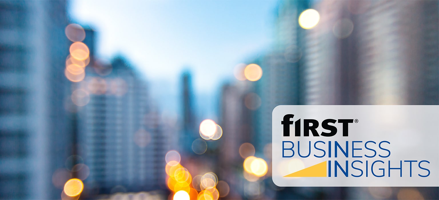 First Business Insights logo over image of city skyline