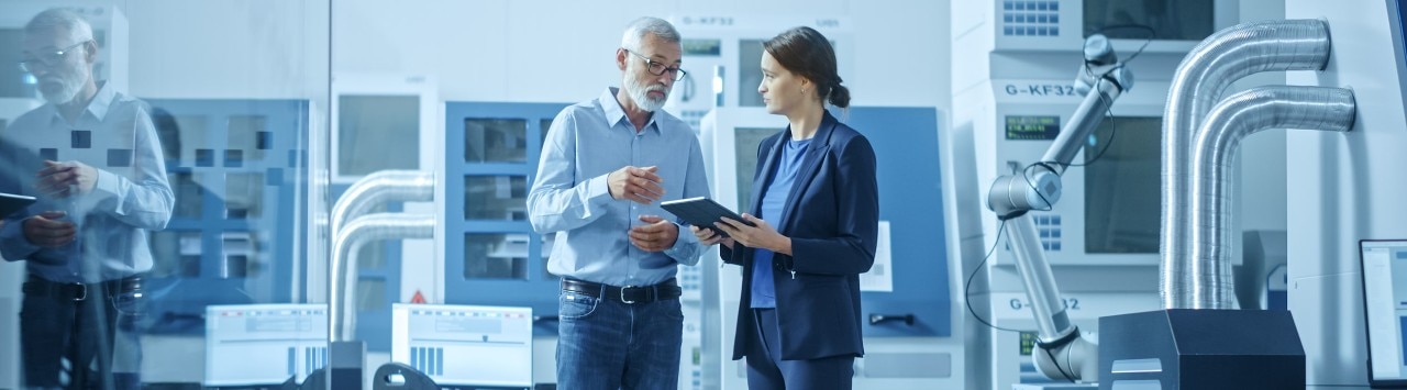 Male business owner meeting with female lending officer