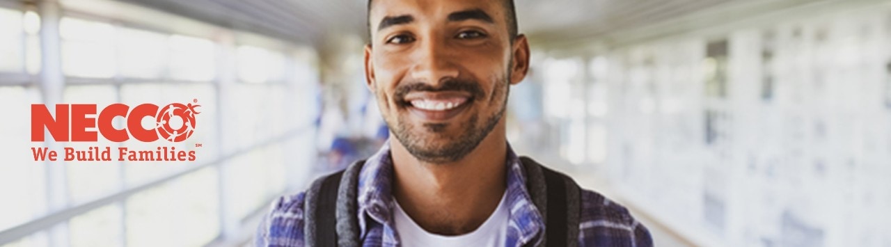 Young Hispanic man holding backpack, with Necco logo