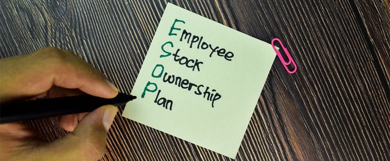 "Employee Stock Ownership Plan" being written on a sticky note