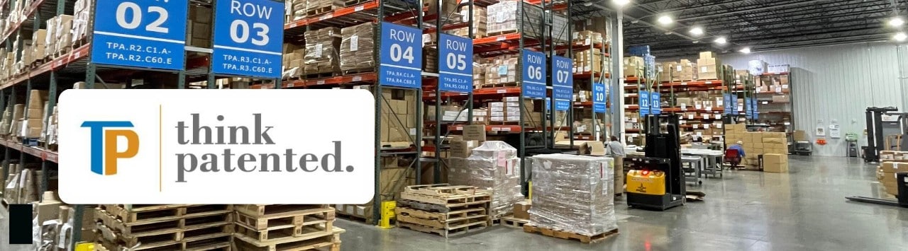 Interior of a fulfillment warehouse with logo overlay reading "Think Patented"