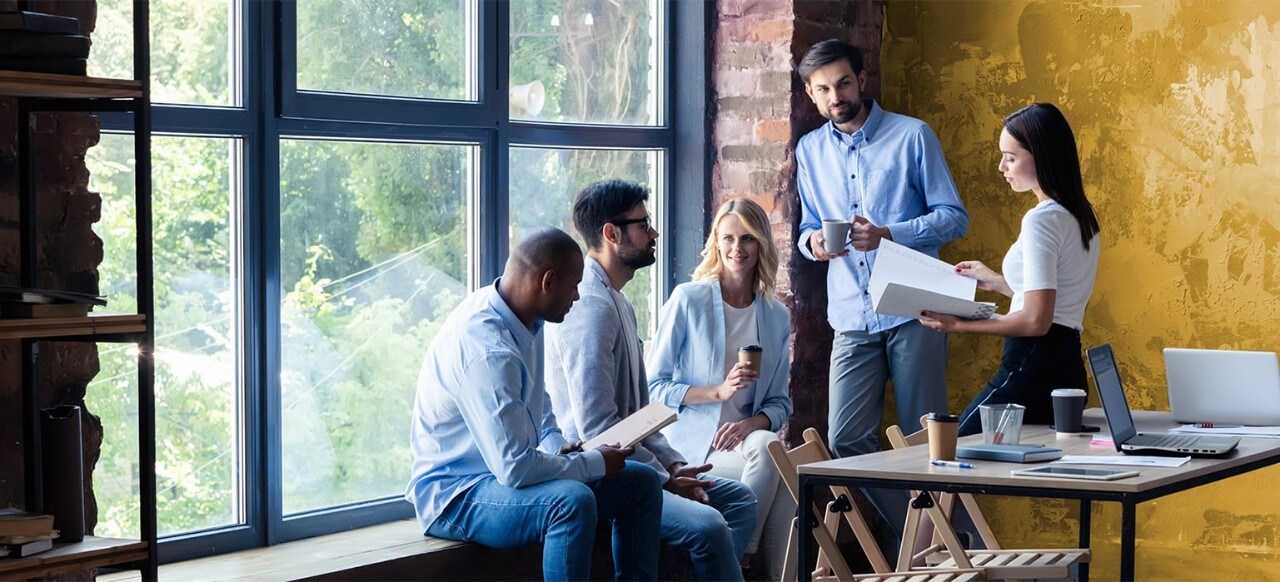 Group of employees in business meeting