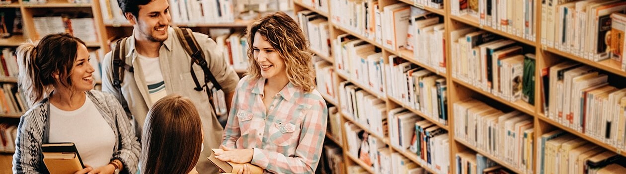 Group of customers interacting at a bookstore