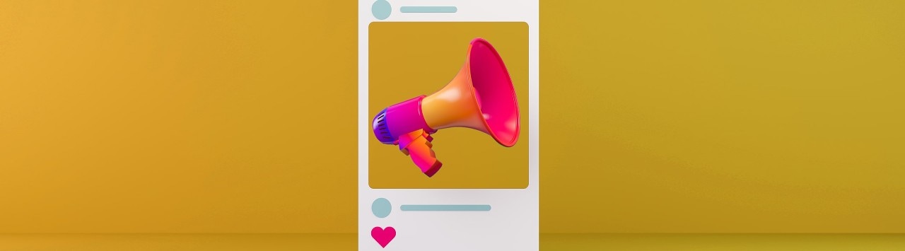 Megaphone in Instagram window on yellow background