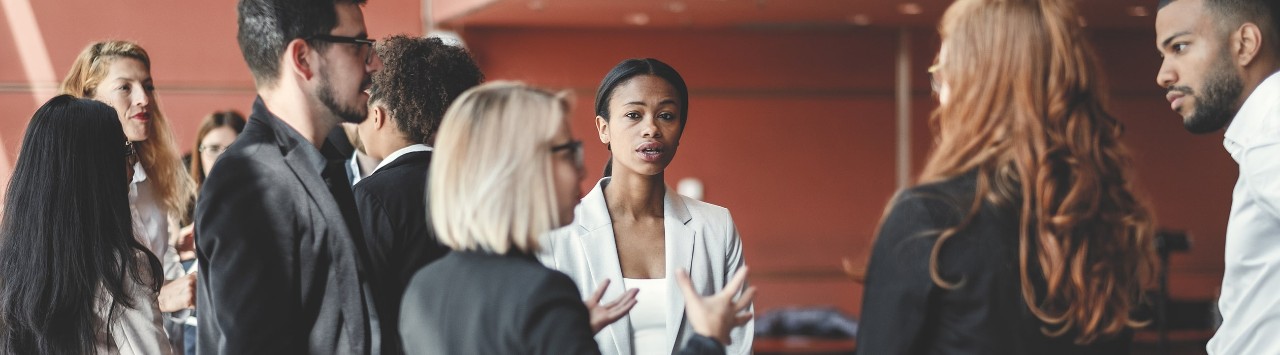 Business owners talking at networking event