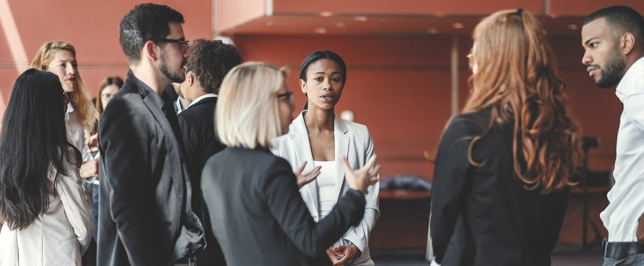 Business owners talking at networking event