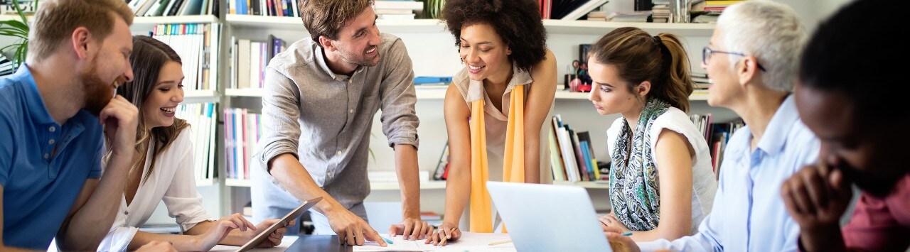 Diverse group of employees in business meeting