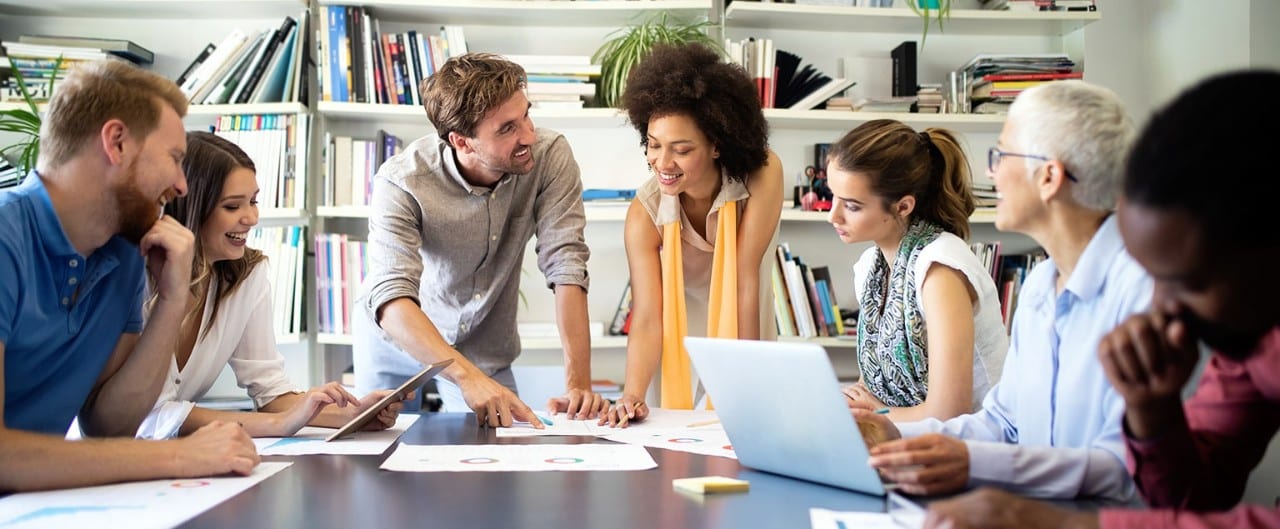 Diverse group of employees in business meeting