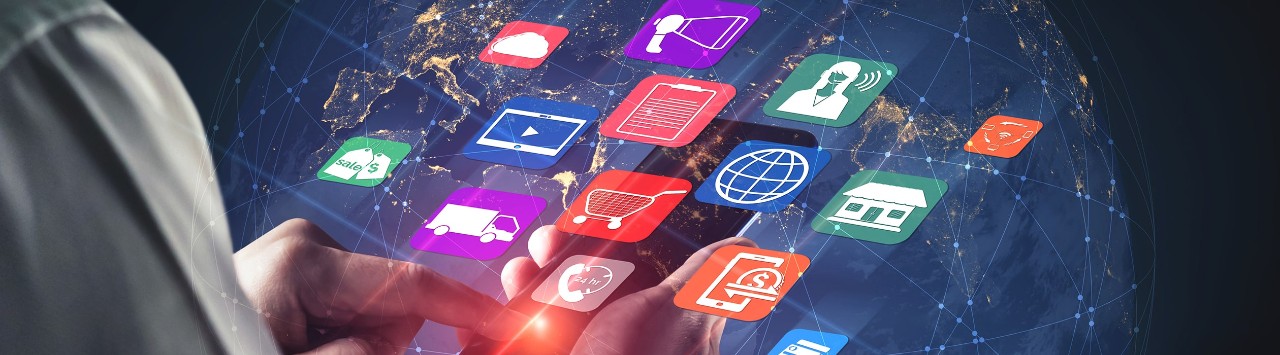 A man holding a phone with digital apps popping out of the screen.