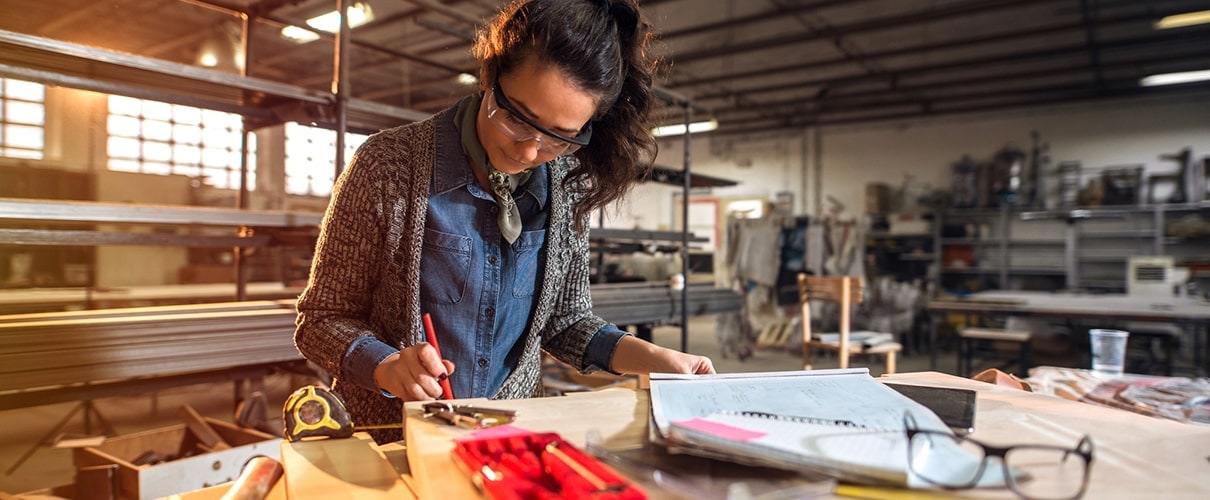 woman architect in her workshop working on new projects