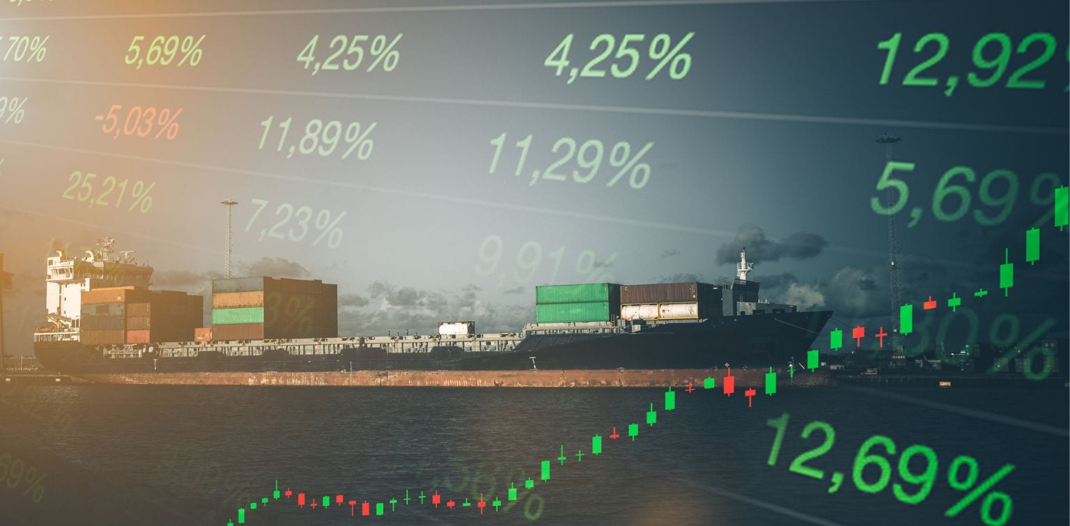 Stock charts and percentages superimposed over a wide view of fuel barges