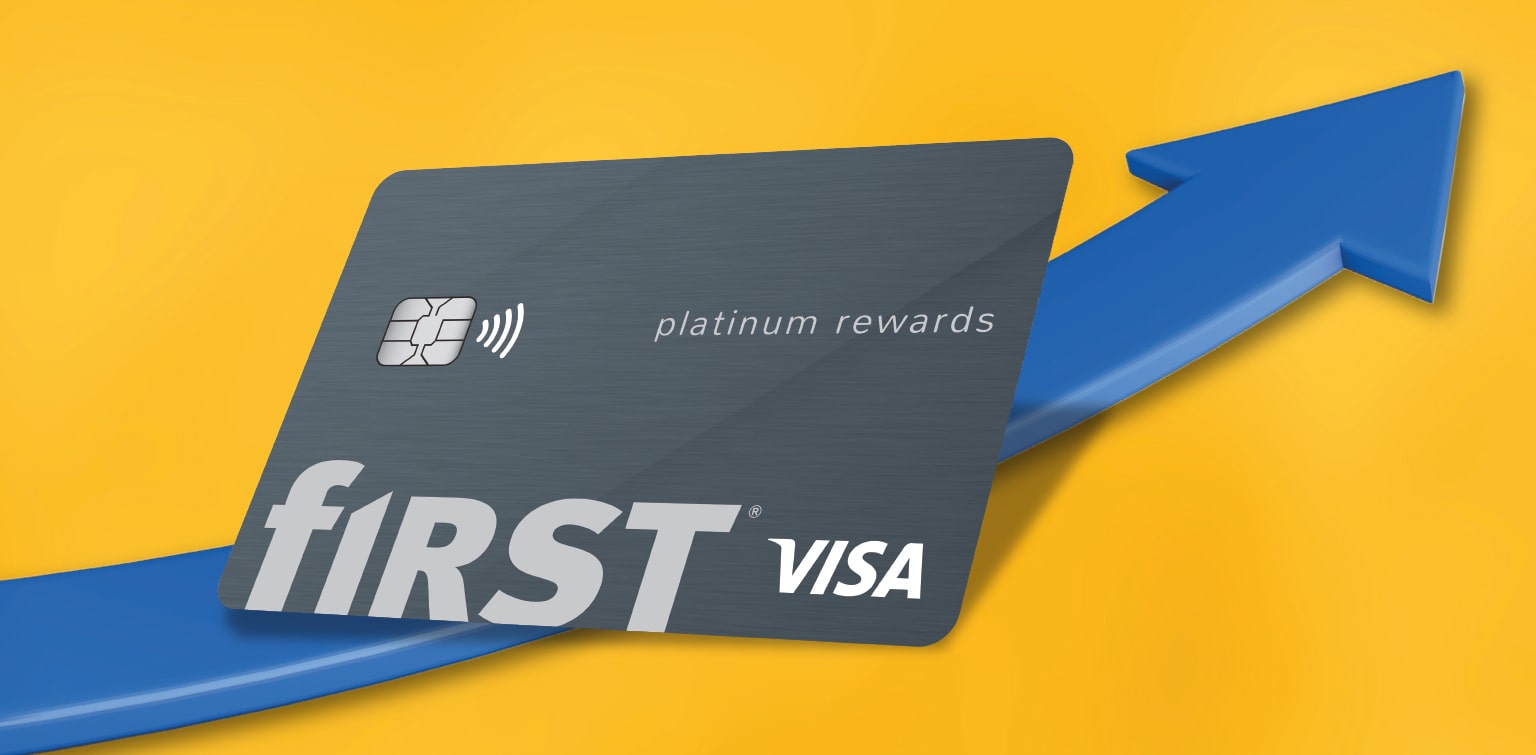 First Financial Bank credit card on top of blue growth arrow