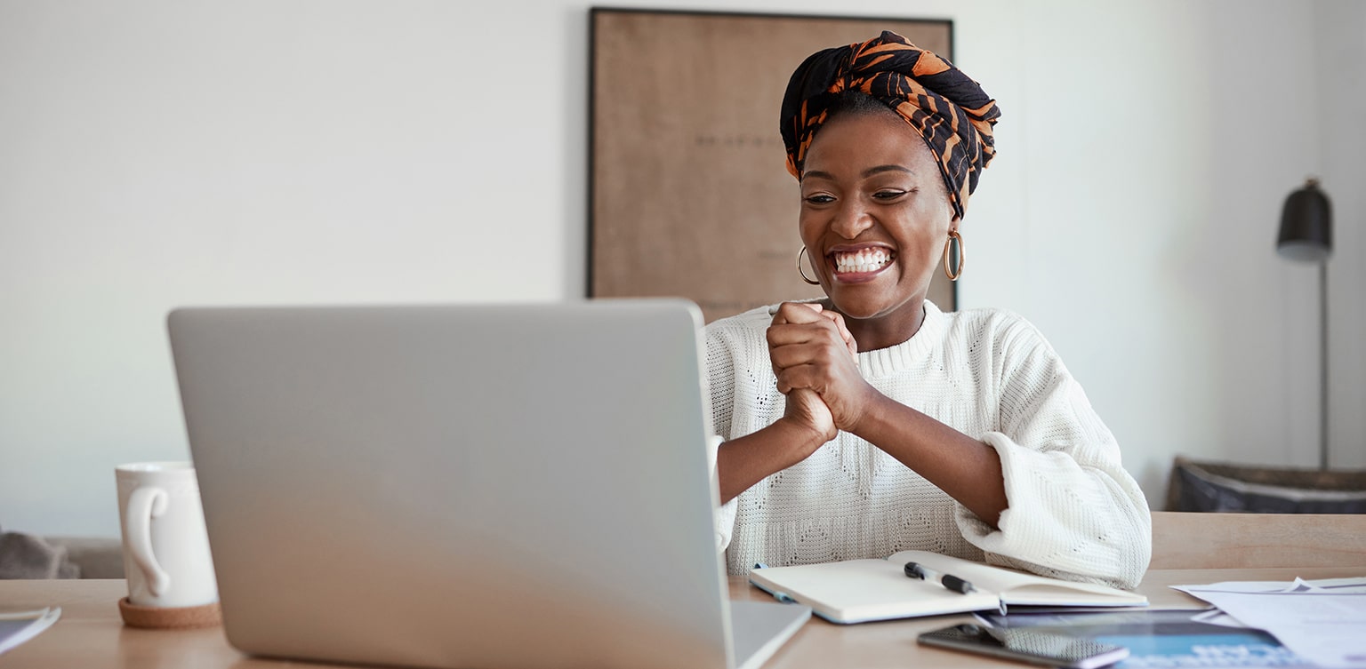 African American female entrepreneur participating in online meeting