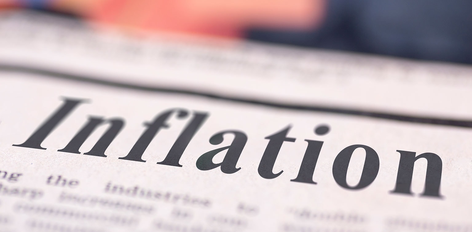 Close up of the word "Inflation" in a newspaper headline
