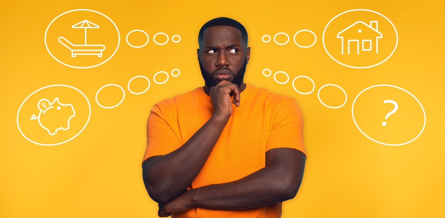 African-American man with confused look standing in front of thought bubbles including lounge chair, piggy bank, house and question mark