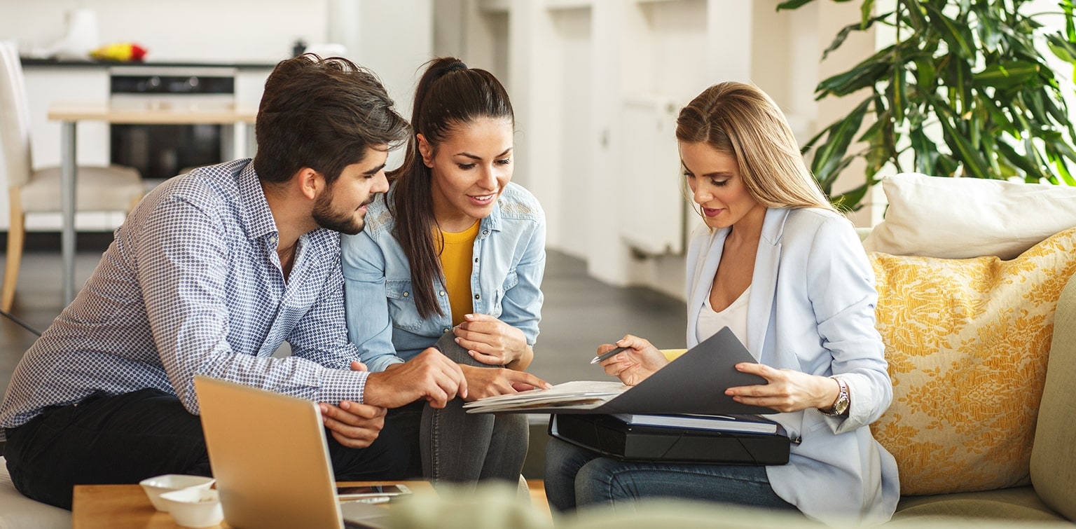 Couple meeting with wealth advisor