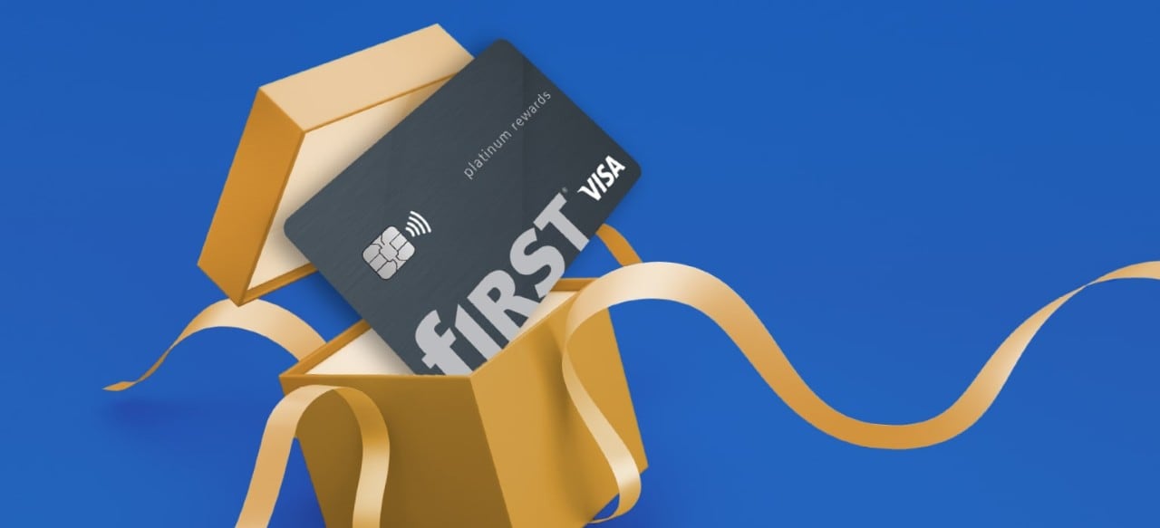 First Financial Bank credit card erupting from a gift box on a blue background