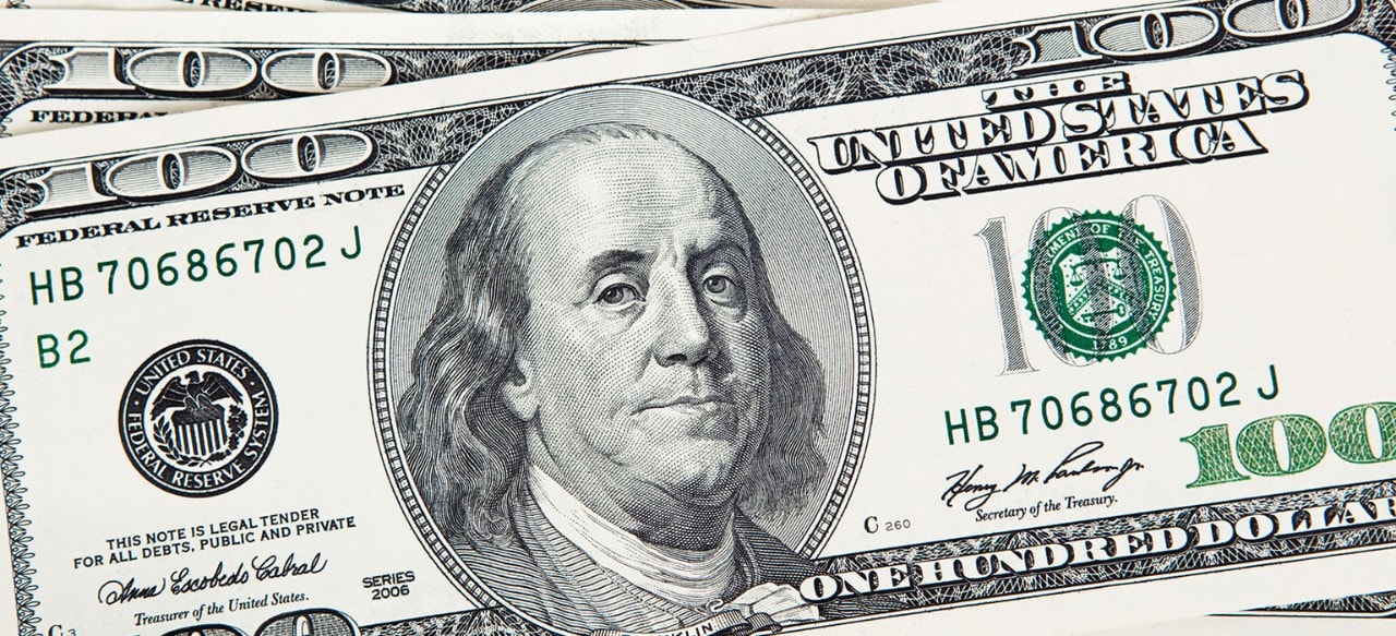 A stack of crisp $100 (USD) bills