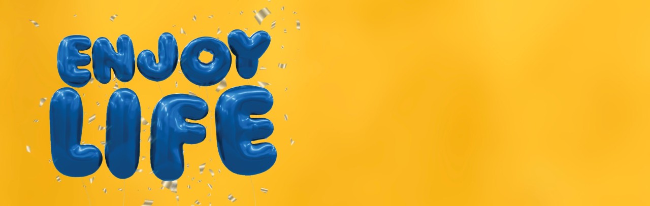 "Enjoy Life" spelled out in blue balloons on a gold background