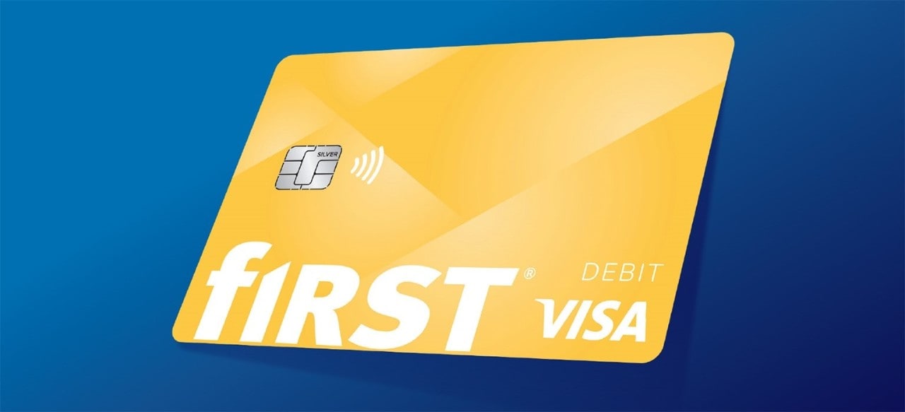 First Financial Visa debit card on blue background