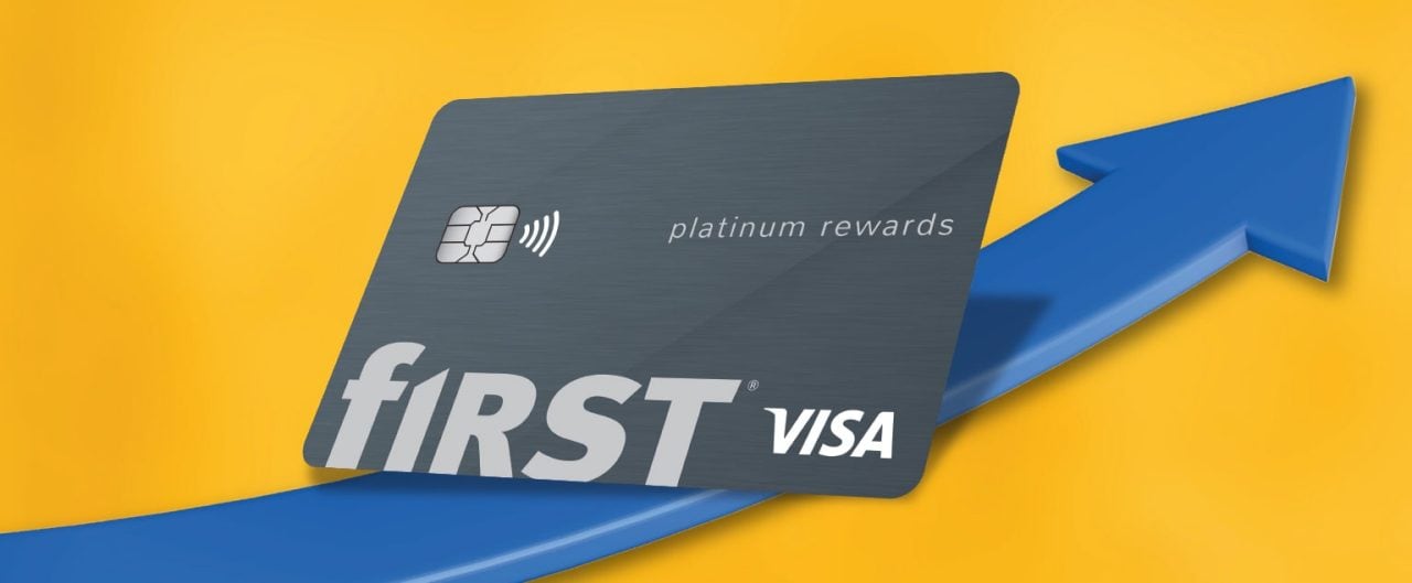 First Financial Bank credit card on top of blue growth arrow