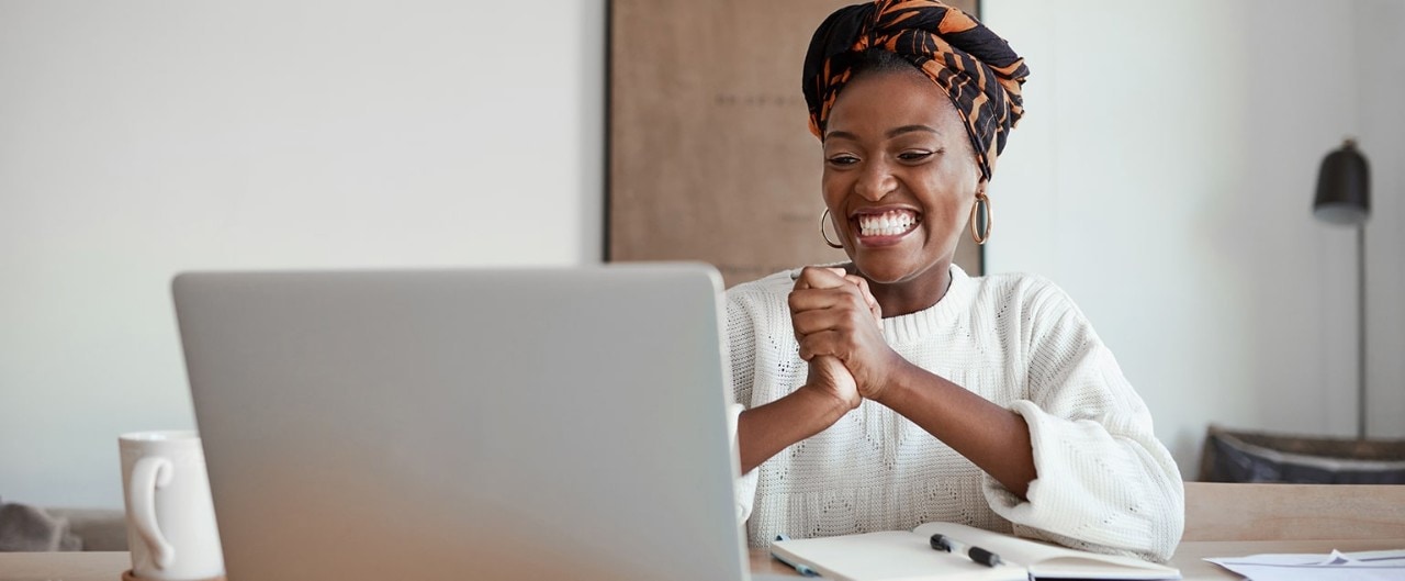 African American female entrepreneur participating in online meeting