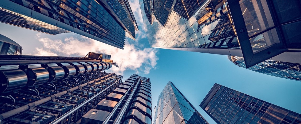 View of a financial district's skyscrapers from a ground-up perspective