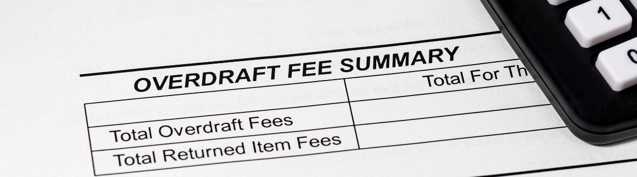 Closeup of overdraft fee summary on bank statement