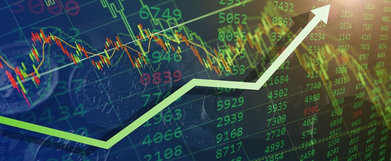 A digital financial chart with graphs, trend lines, and binary numbers, all set on a blue background.