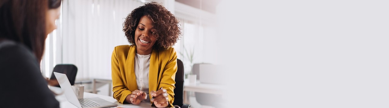 African-American female banker meeting with client