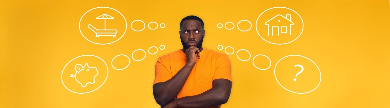 African-American man with confused look standing in front of thought bubbles including lounge chair, piggy bank, house and question mark