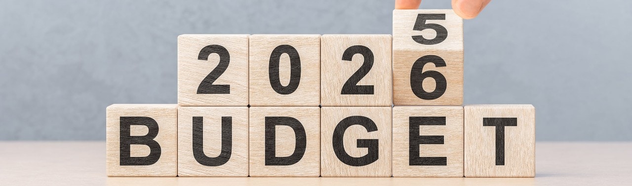 blocks with 2025 budget being turned to show 2026