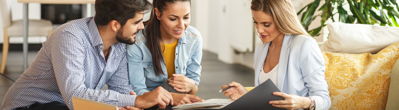 Couple meeting with wealth advisor