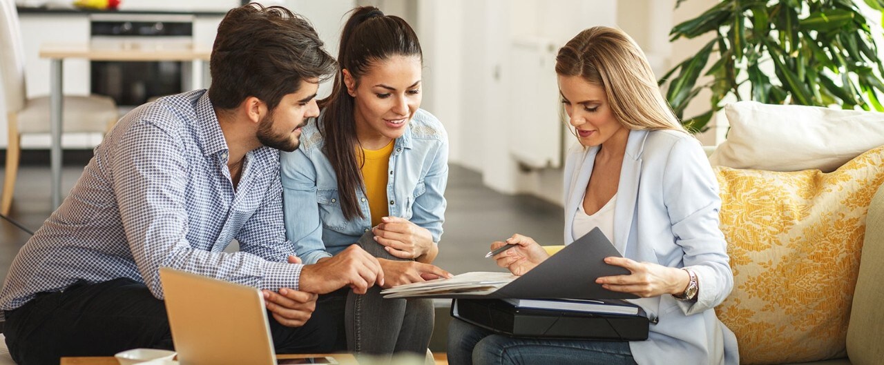 Couple meeting with wealth advisor