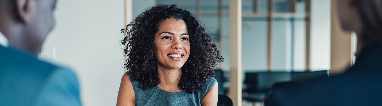 Woman asking, “Do I need a wealth advisor?” and learning how an advisor can help plan for goals including retirement, estate planning, and manage investments.