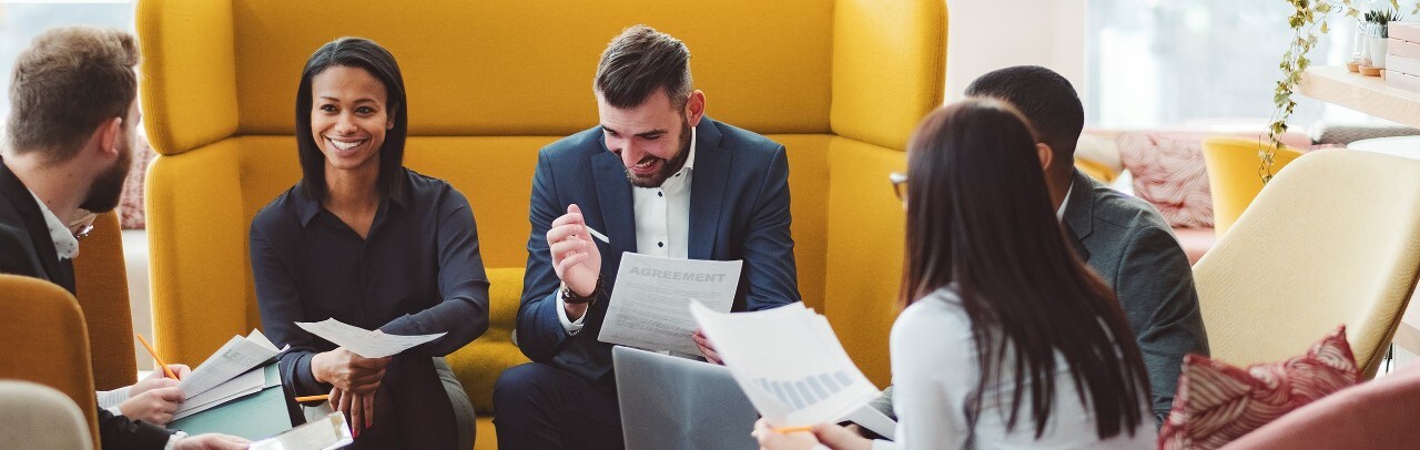 Diverse group of professionals at business meeting