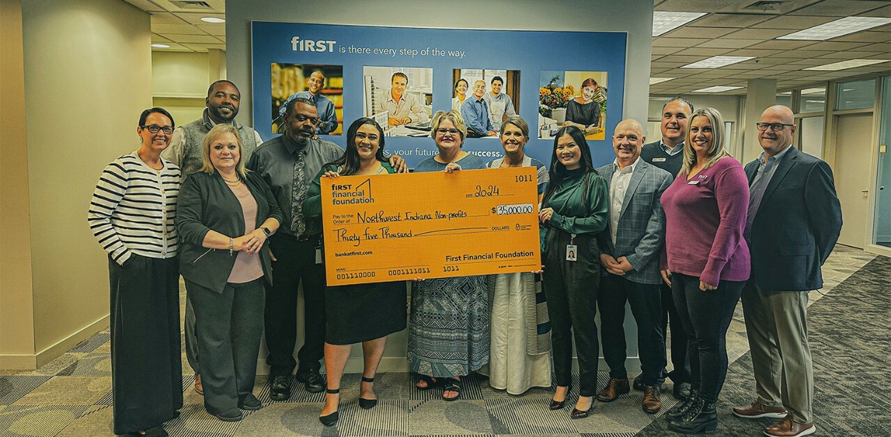 First Financial associates presenting donation check to Northwest Indiana nonprofits